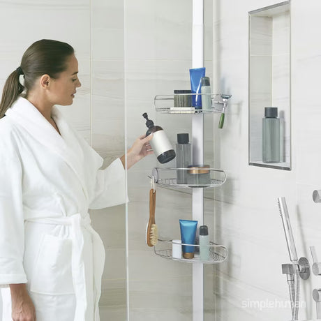 Nastavljiv tuš palica Simplehuman Shower caddy z žičnatimi policami kotna  v izvedbi iz nerjavnega jekla.