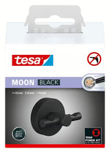 Mat črn kopalniški kavelj Tesa Moon Black z lepilno montažo brez vrtanja