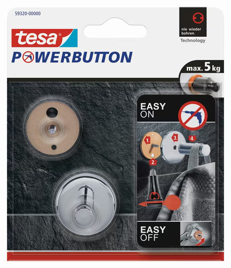Kromiran kavelj Tesa powerbutton pro montaža brez vrtanja na ploščice in druge gladke površine.