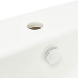 Viseči umivalnik Vitra Integra 50x43 cm z odprtino pro za armaturo na sredini v beli barvi.