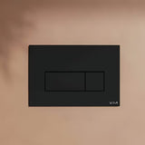 Crne mat aktivirna tipka Vitra Root Square pro vodokotlića vitra s mehaničkim dvokoličinskim ispiranjem.