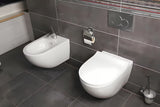 Beli viseča WC školjka vitra Shift brez splakovalnega kroga s skritim pritrjevanjem in zaobljeno obliko.