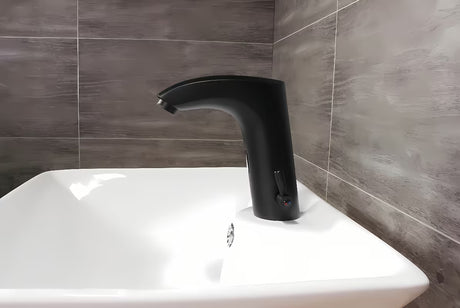 Crna beskontaktna armatura za umivalnik Weltservis Donner AutoFlow 02 s infracrvenim senzorom i ručicom pro za podešavanje temperature.