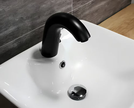 Crna beskontaktna armatura za umivalnik Weltservis Donner AutoFlow 03 s infracrvenim senzorom i upravljačkom ručicom.